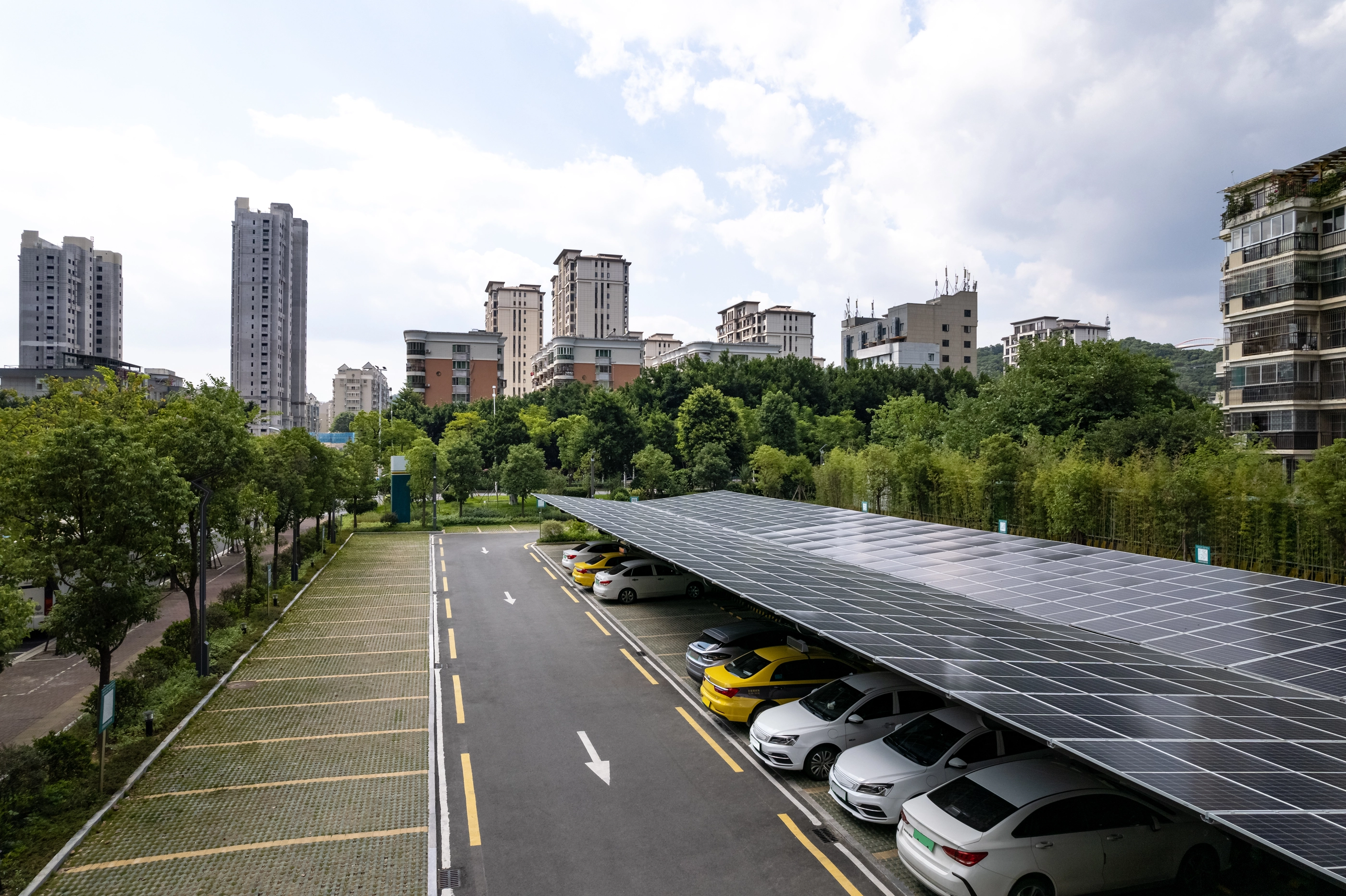Urban parking lot with solar panels on the roof